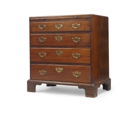 A George III mahogany bachelors chest of drawers, circa 1770, with a moulded caddy top above a slide and four drawers, on bra