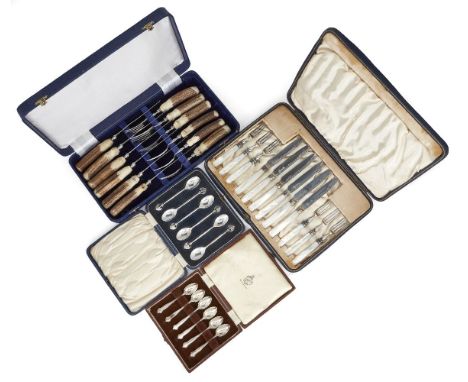 A cased set of mother of pearl handled silver fruit eaters, Sheffield, 1913, Cooper Brothers & Sons, comprising six each fork