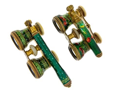 A pair of French gilt-brass and enamelled opera glasses, late 19th century, the bodies and handle decorated floral and scroll