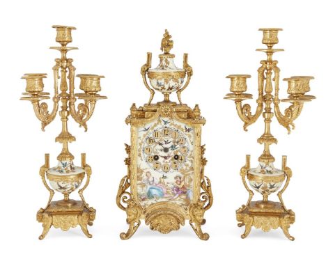 A French ormolu and porcelain mounted clock garniture, late 19th century, the central clock with porcelain and ormolu mounted