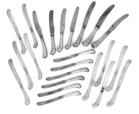 A quantity of 18th and 20th century pistol handled dessert knives, including a set of ten faceted pistol handled knives, make