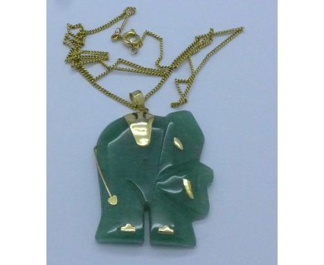 A jade elephant pendant and chain