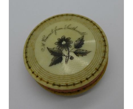 A small circular ivory pin cushion, A Present from Southwell, 47mm