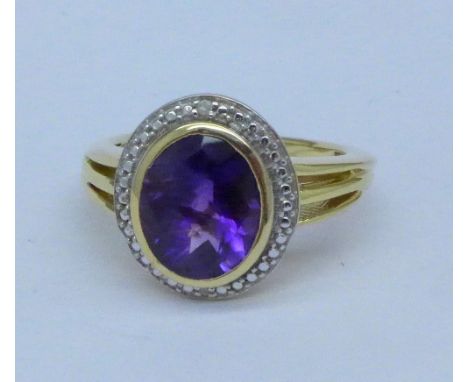 A silver gilt, amethyst and diamond ring, R