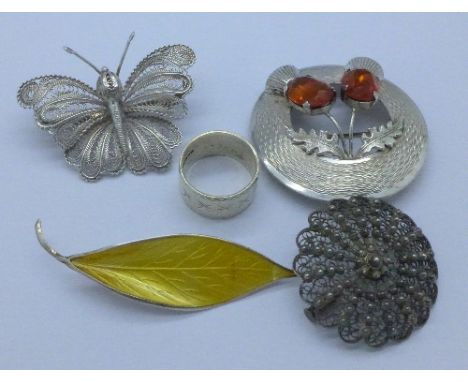 A Norwegian David Andersen silver and enamel brooch, enamel a/f, an 800 silver brooch, a butterfly brooch, a Scottish silver 