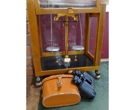 A set of scientific scales, Philip Harris, Birmingham and a pair of binoculars