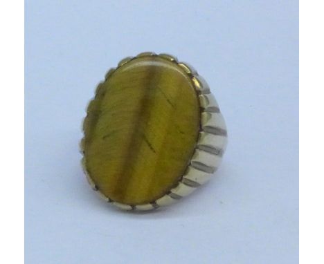 A 9ct gold and tigers eye ring, 6g, R, shank cracked