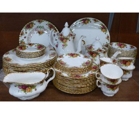 A collection of Royal Albert Old Country Roses china; tea and coffee pot, twelve dinner plates, twelve sandwich plates, six s
