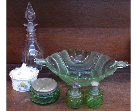 A green glass Art Deco bowl, a three piece green glass dressing table set, a decanter and a Crown Staffordshire lidded pot