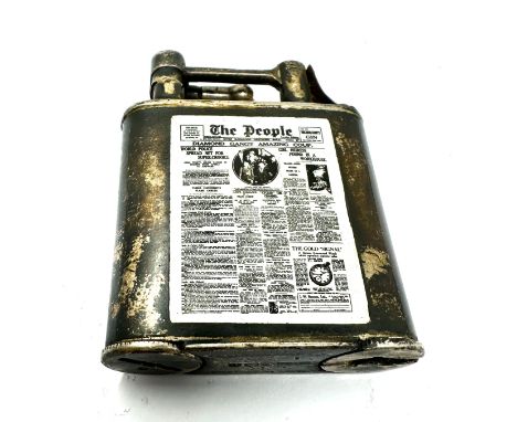 Silver lift arm cigarette lighter with the enamel the people news paper 