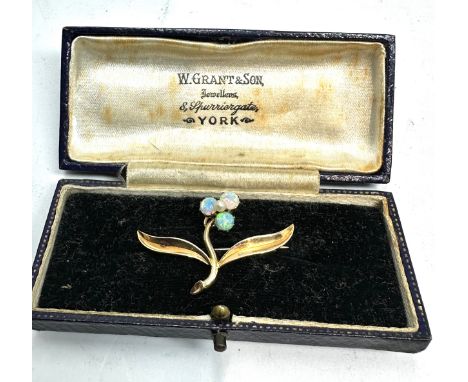 Boxed antique 15ct gold opal pendant / brooch measures approx 3.6cm wide 2.4cm drop weight 3.1g come in antique box 