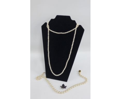 Mixed lot to include a double strand of cultured pearls on a 9 carat gold clasp fitting, Sterling leaf brooch and a faux pear