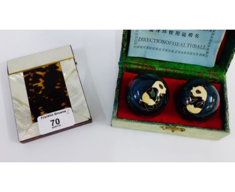 Mother of pearl and tortoiseshell card case, together with a pair of Chinese Cloisonne health balls, (a lot) 