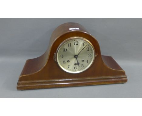 Mahogany mantle clock, the silvered dial with Arabic numerals, 48cm long