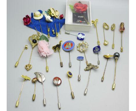 A collection of 29 stick pins 