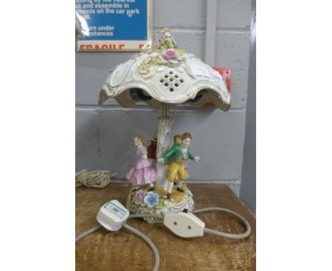 A large Capodimonte table lamp  **PLEASE NOTE THIS LOT IS NOT ELIGIBLE FOR POSTING AND PACKING** 