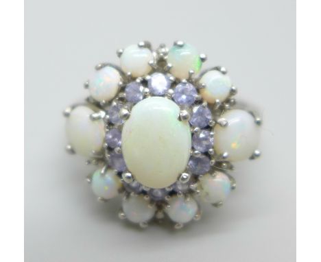 A silver &amp; opal cluster ring, Q 