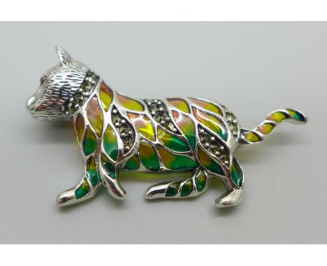 A silver plique a jour cat brooch set with ruby eyes and marcasite, 5.5cm length, stamped 925 