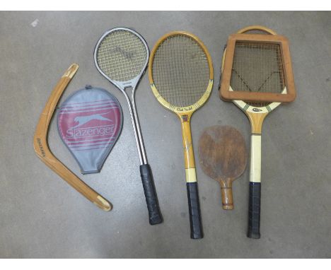 Two tennis racquets including one Dunlop, a squash racquet, a boomerang and a table tennis bat **PLEASE NOTE THIS LOT IS NOT 