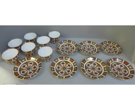 Seven Royal Crown Derby Imari tea cups and saucers, some seconds 