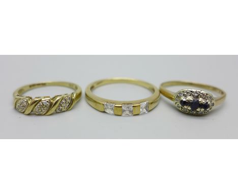 Three 9ct gold rings - a white stone trilogy ring, 2.1g, R, a three stone sapphire and diamond ring, 1.9g, M, and a 9 stone d