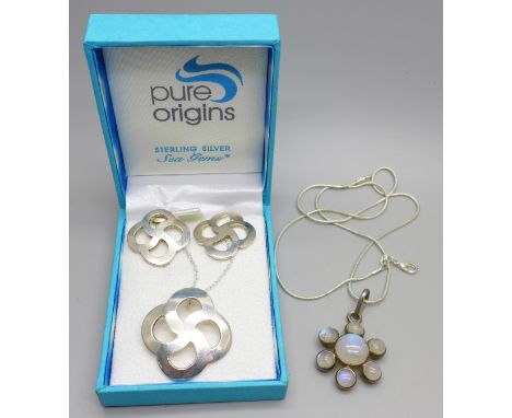 A Celtic silver jewellery set comprising a pair of earrings and a pendant on chain,  and a silver and moonstone pendant 