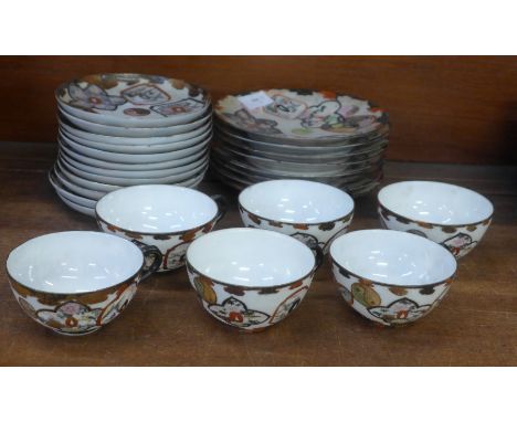 A Chinese tea set with six cups, twelve saucers and eight tea plates 