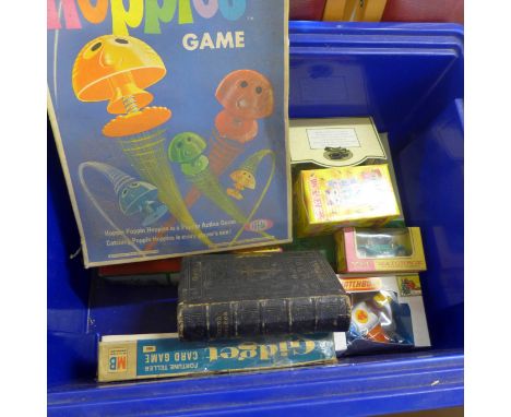 A box of vintage games including Poppin Hoppies