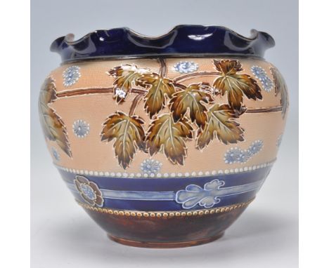 A 19th century Victorian Doulton Lambeth Jardiniere stoneware planter with glazed leaf design with geometric banded decoratio