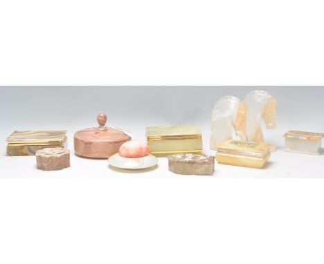 A mixed group of vintage 20th Century marble and onyx wares to include an onyx trinket box raised on brass furry paw feet, a 