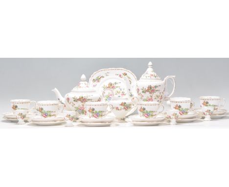 A vintage 20th Century Royal Staffordshire tea / coffee service in the Pagoda pattern comprising of coffee pot and teapot, cu