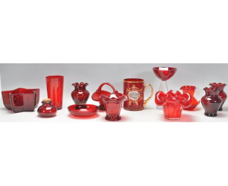 A mixed group of vintage and retro 20th Century&nbsp;studio art glass in cranberry, red and ruby flash red to include vases w