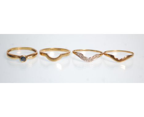 A hallmarked 9ct yellow gold ladies ring ring set with a central blue. Ring size R. Together with a 9ct gold triple stack rin