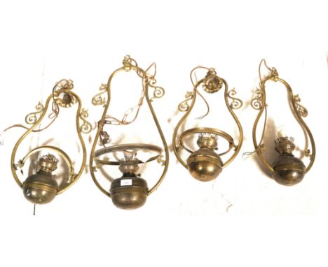 A collection of&nbsp; 4 contemporary&nbsp; &nbsp;antique style large brass hanging lantern of oil lamp type with modern elect