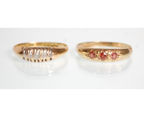 A hallmarked 18ct yellow gold gypsy ring set with five graduating white stones to a decorative pierced mount. Hallmarked for 