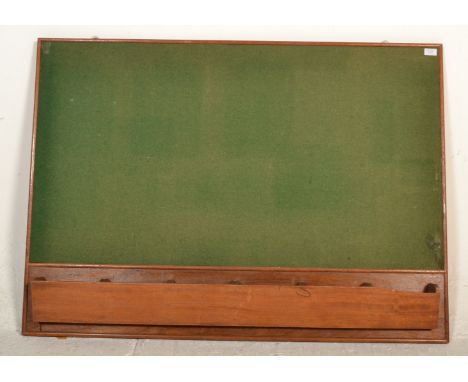 A mid century vintage village hall&nbsp; notice board with baize lined centre in wooden surround having unusual sectional cub