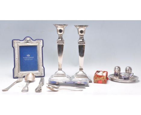 A mixed group of silver and silverplate wares dating from the early 20th Century to include a stamped 800 Continental cutlery