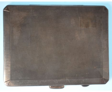 A good silver hallmarked cigarette case of rectangular form having engine turned decoration and gilt interior. Hallmarked for