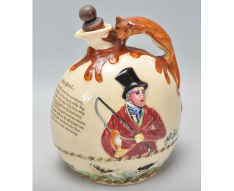 An early 20th Century Crown Devon ceramic&nbsp;John Peel musical flagon flask / decanter having a moulded fox handle. Marks t