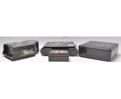 A group of four vintage&nbsp;20th Century Japanese black lacquer jewellery boxes to include a musical example in the form of 