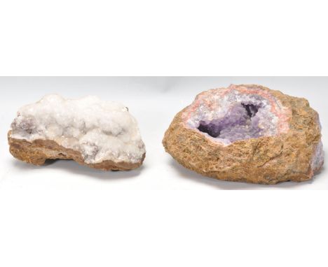 Two geological amethyst geode specimen rocks.&nbsp;