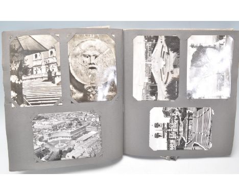 A vintage 20th Century postcard album filled mostly of scenes, architecture, buildings, sculptors in Italy, with most being p