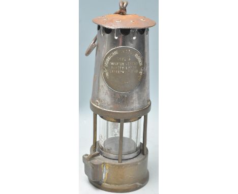 A mid 20th century brass Eccles 'Protector Lamp &amp; Lighting miners lamp embossed 'Protector Lamp &amp; Lighting type 6 M &