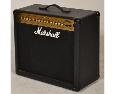 A Marshall MG Series 100DFX Guitar Amplifier&nbsp;in black case with carrying handle atop over dials and speaker with Marshal