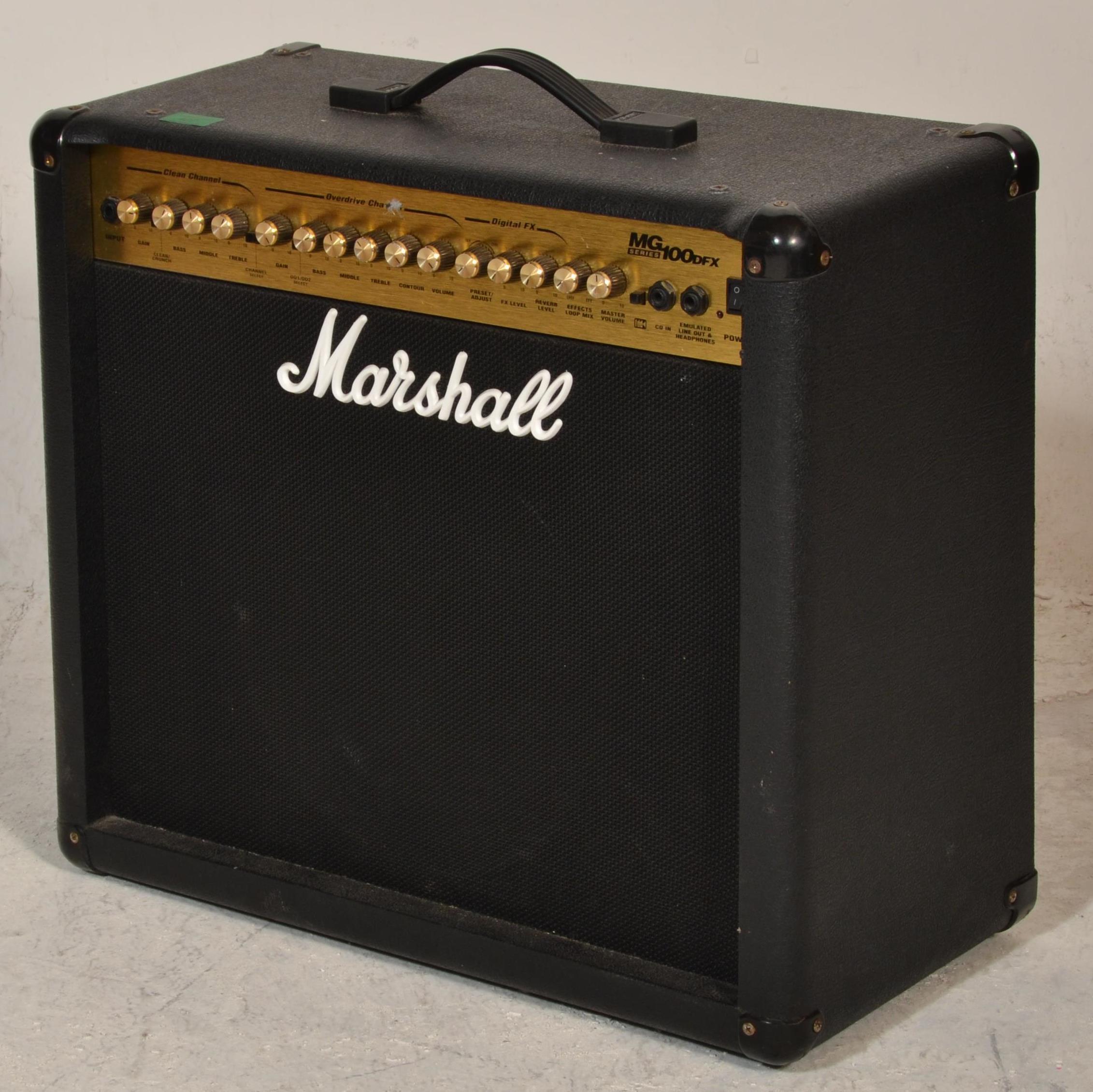 A Marshall MG Series 100DFX Guitar Amplifier in black case with