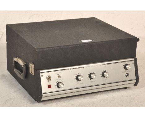 A vintage Portogram mark nine-M record player being black leather cased together with a Castle Acoustics speaker. Measures 22