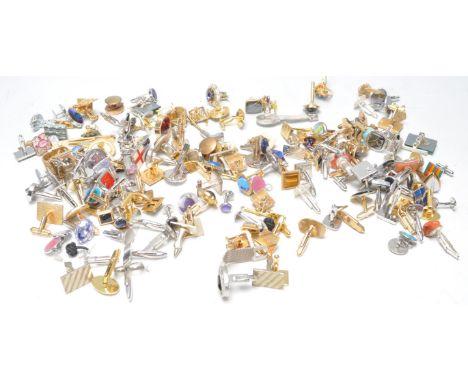 A large collection of vintage and later gentleman's cufflinks of varying designs and materials with many gold tone examples, 