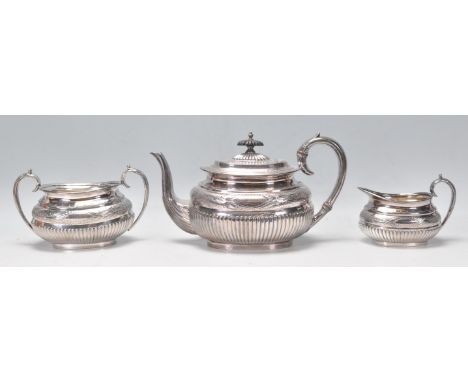 A late 19th century / early 20th century silver plate 3 tea service comprising teapot, sugar bowl and creamer. Stamped to the