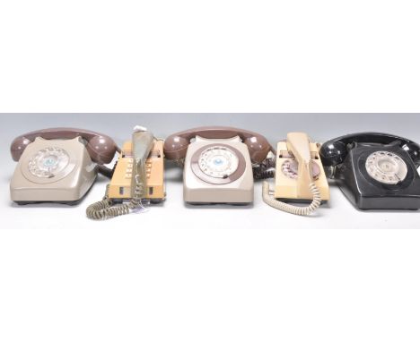 A group of three vintage retro 20th Century&nbsp;rotary dial telephones, one being in a black colourway. Together with two Tr