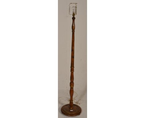 A vintage 20th Century Chinese standard lamp light having a turned stem column with gilt banding and&nbsp;Chinoiserie decorat